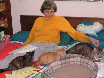 Rhea White and 3 of her Cats